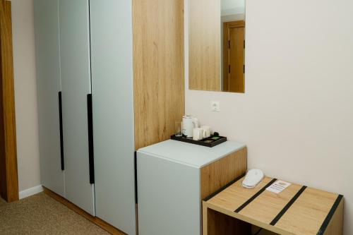Kuchyň nebo kuchyňský kout v ubytování Graf Hotel