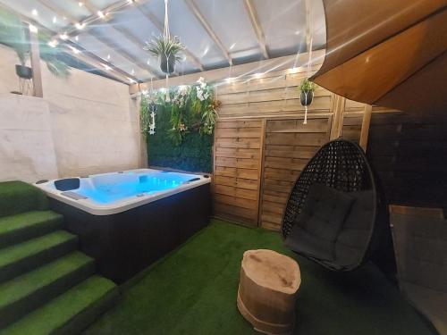 suite spa jacuzzi tout confort – Photos 5