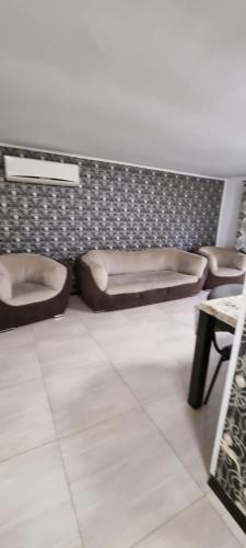 a room with two dog beds on a wall at VILA DAVISON in Târgu Jiu
