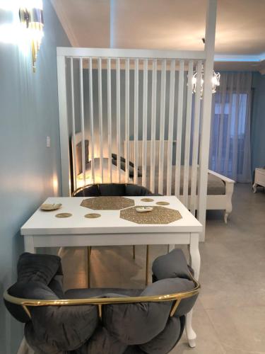 Postel nebo postele na pokoji v ubytování Apartments MERLIN Sienkiewicza Zamość