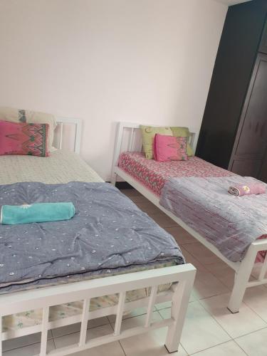 Ein Bett oder Betten in einem Zimmer der Unterkunft Like Home