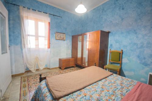 Katil atau katil-katil dalam bilik di Shaka guest house