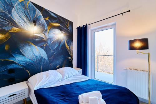 Posteľ alebo postele v izbe v ubytovaní LAGUNA Apartament Polanica Residence 59 z klimatyzacją