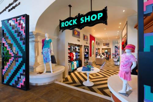 a rock shop with mannequins on display in a store at Hard Rock Hotel Riviera Maya - Heaven Adults Only - All Inclusive in Puerto Aventuras