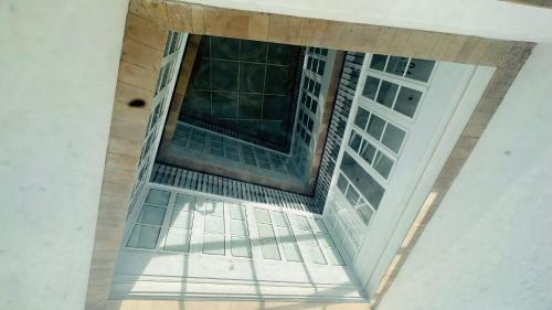 an overhead view of a window in a building at Apartamentos GADIR CENTRO in Cádiz