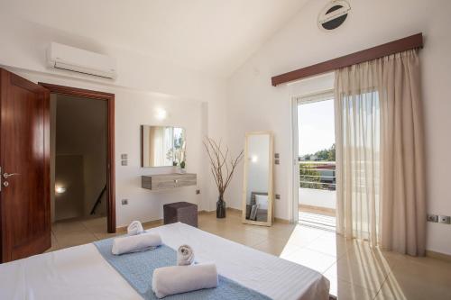 Postel nebo postele na pokoji v ubytování Summer Dream Villa