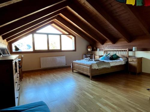 Katil atau katil-katil dalam bilik di Ático dúplex Casa Ximet