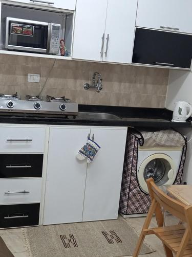 Kuchyň nebo kuchyňský kout v ubytování شاليه فندقي بقرية جراند هيلز الساحل الشمالي Grand Hills North Coast كود E45 للعائلات فقط