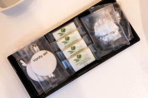 a package of soap in a box on a table at Metropolitan Rooms in Cagliari
