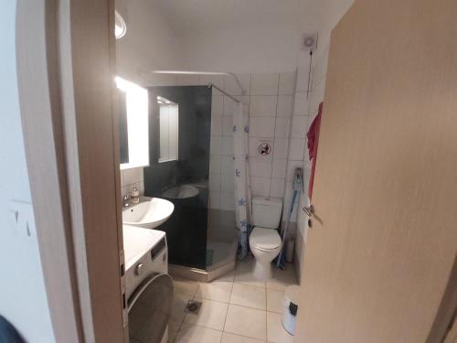 Et badeværelse på Port bay view, Porto Coufo