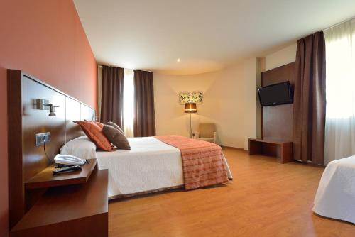 Hotel Spa Norat Torre Do Deza 4* Superiorにあるテレビまたはエンターテインメントセンター