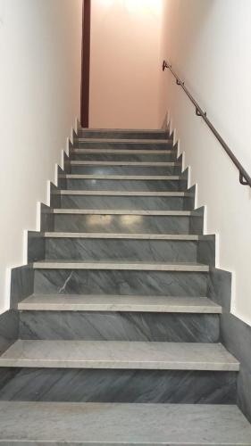 a set of stairs in a building at Elico Di Sicily B@B in Sambuca di Sicilia