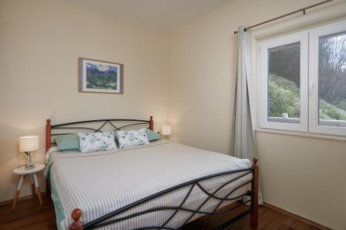 Posteľ alebo postele v izbe v ubytovaní Dubrovnik View Apartments