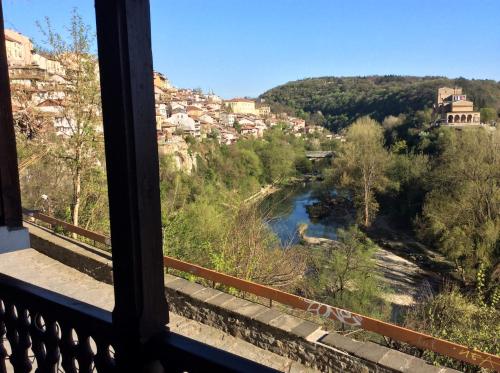 a view of a river from a balcony at Gurko Hotel in Veliko Tŭrnovo