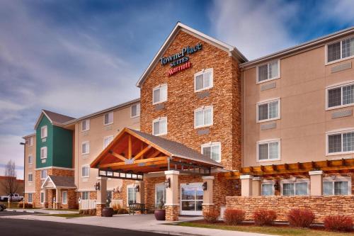 a rendering of a hotel with a brick building at TownePlace Suites Boise West / Meridian in Meridian