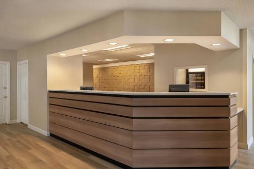 a bar in a room with a counter in a room at Residence Inn Deptford in Almonesson