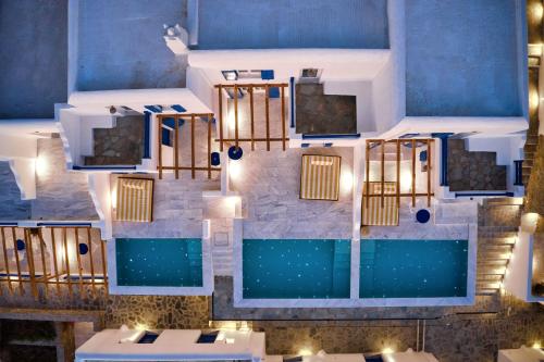 an overhead view of a pool in a hotel at San Antonio Summerland in Mýkonos City