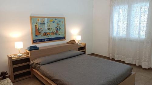 Krevet ili kreveti u jedinici u objektu Villa Ginevra