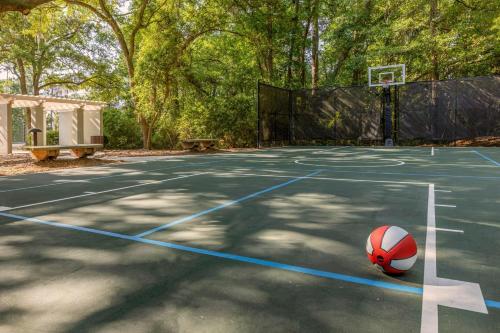 a tennis ball on a court with a basketball at Marriott's SurfWatch in Hilton Head Island