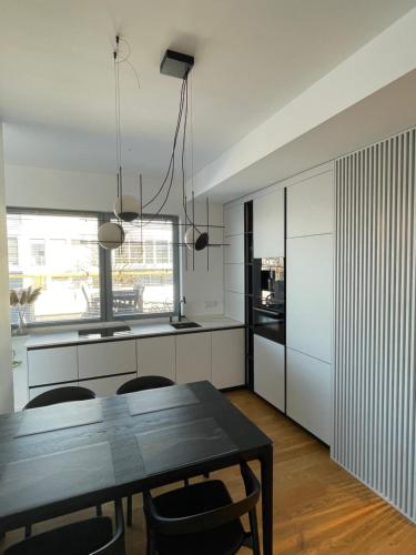 Η κουζίνα ή μικρή κουζίνα στο Rannakivi Penthouse