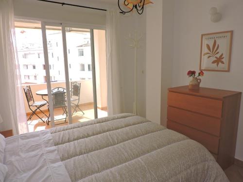 Postel nebo postele na pokoji v ubytování Bonito ático con terraza