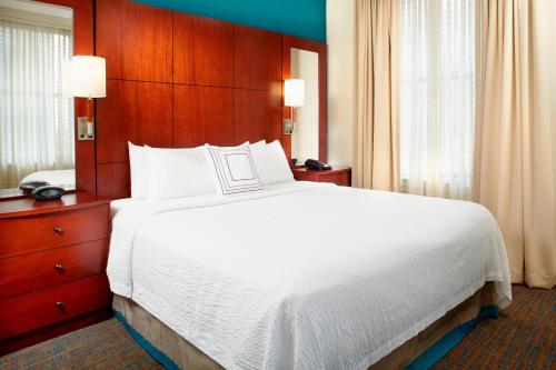 a large white bed in a hotel room at Residence Inn Columbus Downtown in Columbus