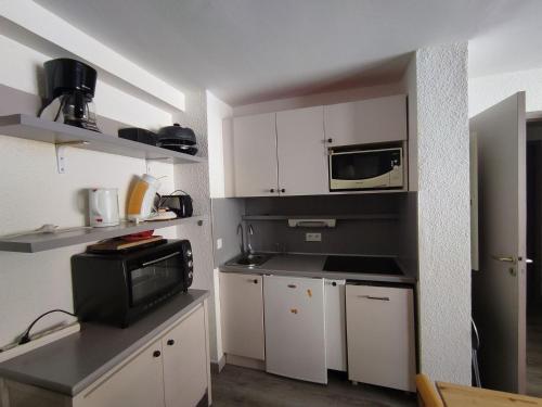 Appartement cosy avec balcon, piscine et parking en option à Plagne 1800