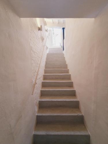 a stairway leading up to a building with a stair case at Allegra Toscana - Affittacamere Guest house Arezzo in Arezzo