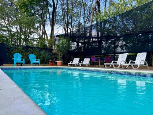 Bazén v ubytování Tucan Hotel nebo v jeho okolí