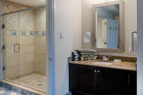 a bathroom with a sink and a shower at Marriott St. Kitts Beach Club in Frigate Bay