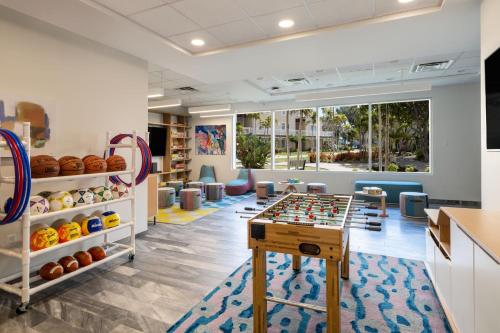 a game room with a foosball table and chairs at Marriott St. Kitts Beach Club in Frigate Bay