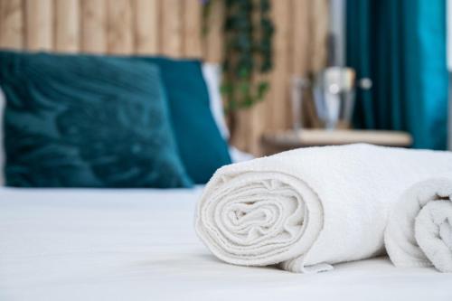 Postel nebo postele na pokoji v ubytování Il corso suite rooms