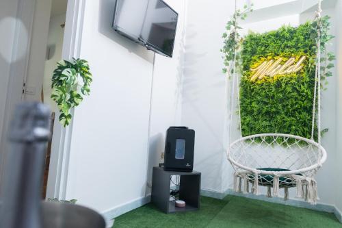 TV a/nebo společenská místnost v ubytování Il corso suite rooms
