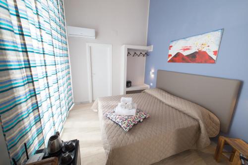 Posezení v ubytování GreRos H. Rooms Napoli Centro by Clapa Group Dislocated Hospitality