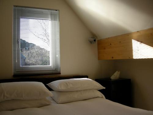 Krevet ili kreveti u jedinici u okviru objekta Blar na Leisg self catering Lodge 1