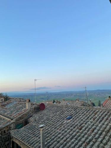 a view of an old roof of a building at Da Nonna Bruna in Montalcino