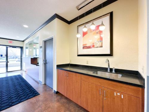 a kitchen with a sink and a counter top at Blaine Town Inn & Suites in Blaine