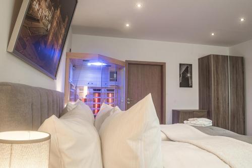 Ένα ή περισσότερα κρεβάτια σε δωμάτιο στο Hotel Ehranger Hof