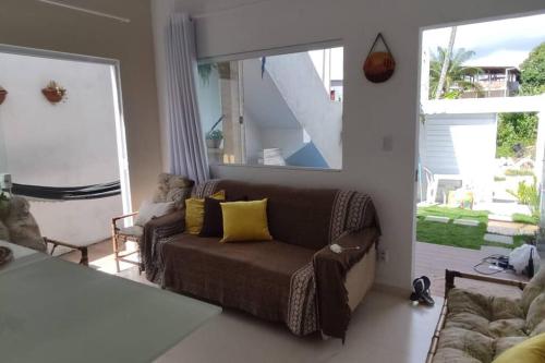 Khu vực ghế ngồi tại Casa Aconchego de Jacuípe, Ar condicionado e Piscina Privativa