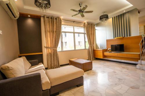Uma área de estar em Cozy Gurney Georgetown Private Apartment Penang