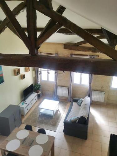 Una cama o camas en una habitación de Gite de la Cathédrale 2