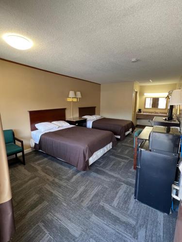 Krevet ili kreveti u jedinici u okviru objekta Green Valley Motel Winston Salem