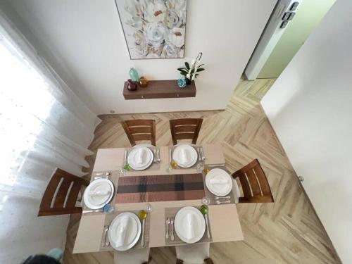 an overhead view of a dining table and chairs at Casa Copan in Cancún