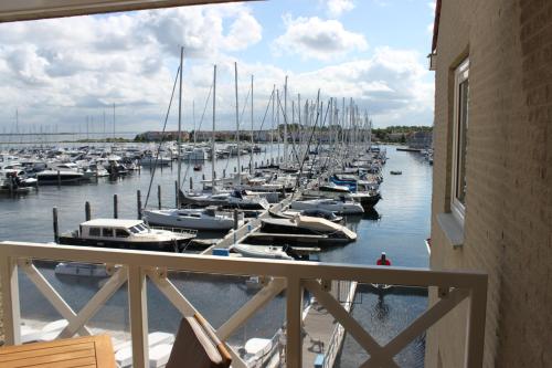 a bunch of boats docked in a marina at Appartement Marina Port Zélande - Brouwersdam Zeeland in Ouddorp