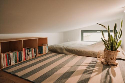 Posteľ alebo postele v izbe v ubytovaní Antresola13