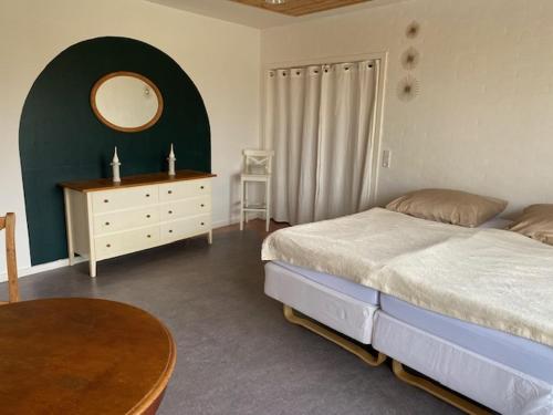 Postel nebo postele na pokoji v ubytování Hollys Bed & Breakfast