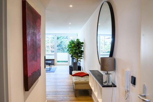Χώρος καθιστικού στο OrangeHome Design Apartment zwischen See & Zentrum
