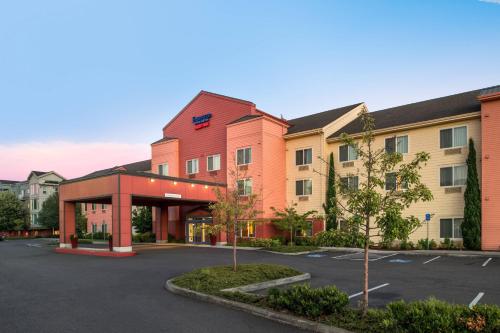 a rendering of the front of a hotel with a parking lot at Fairfield Inn & Suites by Marriott Portland North in Portland