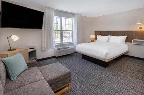 Tempat tidur dalam kamar di TownePlace Suites New Orleans Metairie