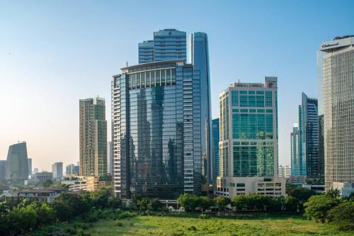 a group of tall buildings in a city at JW Marriott Hotel Jakarta in Jakarta